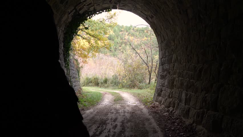 Footage of female walking outside of tunnel in Zavrsje city in Croatia