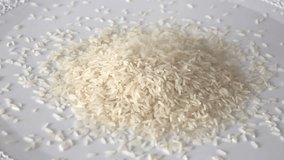 Rice (lat. Oryz) seeds fall on the table. Source of carbohydrates, contains little protein. Add to your diet diet, veganism. video