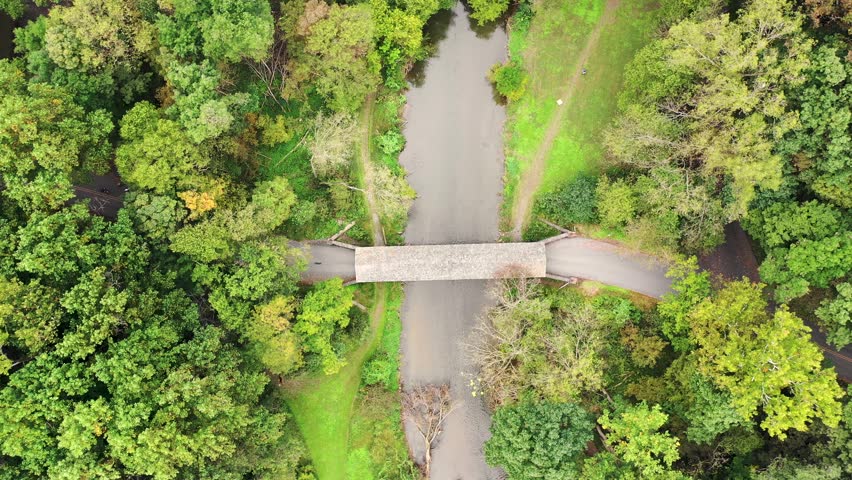 Aerial straight down drop to the roof of Kurtz