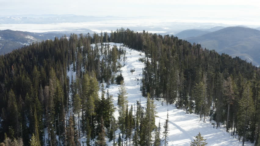 Colville National Forest in Stevens County Washington Winter Snowy Sunny Day Aerial