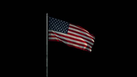 Flag of the US (United States of America ) on flagpole waving on wind, realistic 3d animation on black seamless loop, 20 seconds long (alpha channel is included)