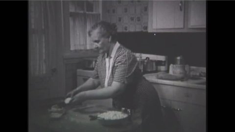 CIRCA 1930 - Immigrant Italian cooking in New York city in the 1940's.