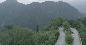 Aerial footage of curvy mountain roads in the summer in Italy, Near Venice.