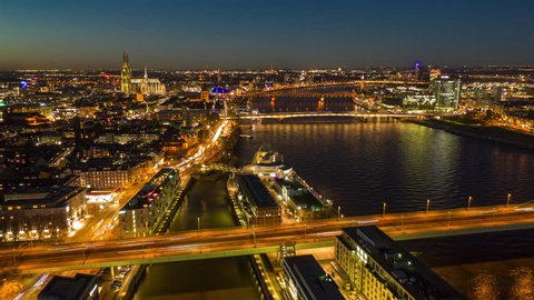 Aerial timelapse of Cologne city at night, Germany.