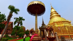 4K time lapse video of Phra That Hariphunchai temple, Thailand.
