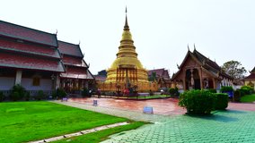 4K time lapse video of Phra That Hariphunchai temple, Thailand.