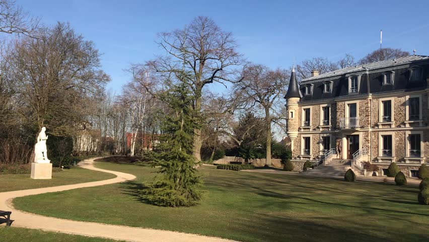 Small castle in a park. "Chateau des Tourelles", Plessis-Trevise, France
