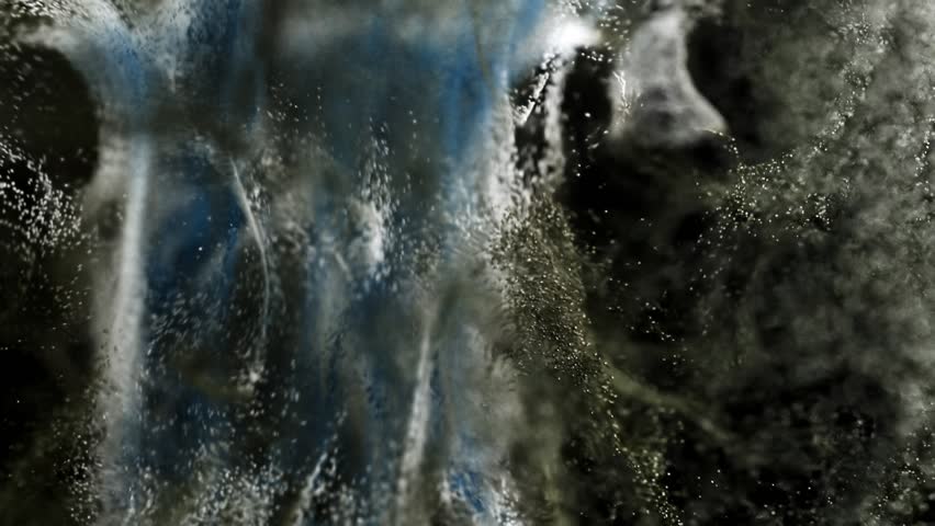 Incredible macro view of a CG paint powder explosion. Slow motion. Seamless loop.