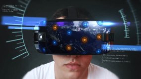 Young man wearing VR headset and experiencing virtual reality. Technology related digital earth network concept. - Powered by Shutterstock - Get 15% off with code: PIKWIZARD15