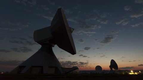 4K Time lapse close up Parabolic satellite dish sunrise at the earth radio station in Raisting
