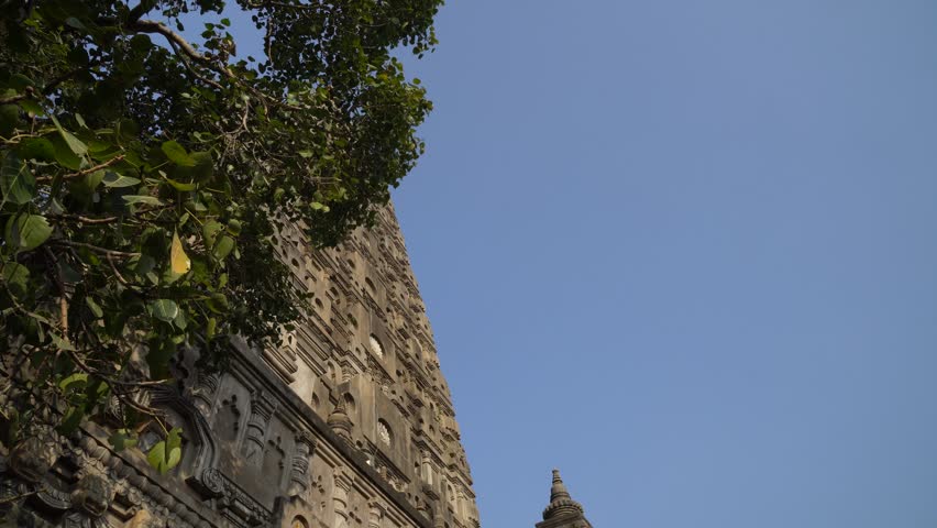 The view of the stupa at Mahabodhi Temple Complex in Bodh Gaya, India. The Mahabodhi Vihar is a UNESCO World Heritage Site. 