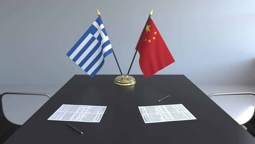 Flags of Greece and China and papers on the table. Negotiations and signing an international agreement. Conceptual 3D animation
