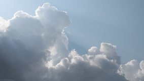 Full HD video time lapse of cloud running across the blue sky, rolling puffy cloud are moving, white lightnes clouds time lapse. Nature concept.