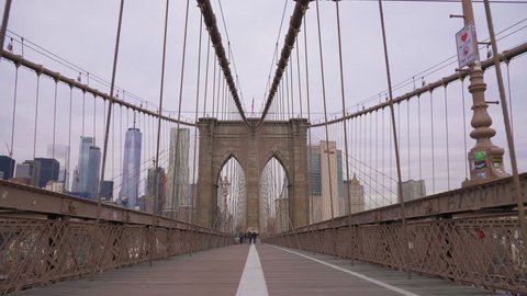 NEW YORK CITY, USA - NOVEMBER 25, 2018: Brooklyn Bridge and Manhattan Skyline. New York City. Steadicam Shot. United States of America