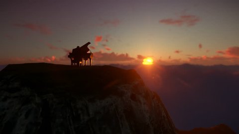 Man playing piano on top of a mountain above clouds against beautiful sunrise, drone view 4K