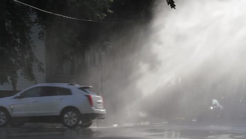 Chicago, IL / USA - July 19th 2015: A Fire Hydrant spraying Chicago streets