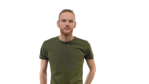 Slowmo cute redhead hipster young guy shrugging smirking uncertain, having doubts, standing clueless, puzzled answer unsure what say, unimpressed, unbothered careless, white background
