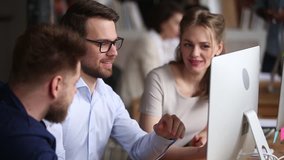 Three colleagues working together discuss computer project teamwork, business people corporate team coworkers cooperating laughing at workplace, smiling employees group having fun talking in office - Powered by Shutterstock - Get 15% off with code: PIKWIZARD15