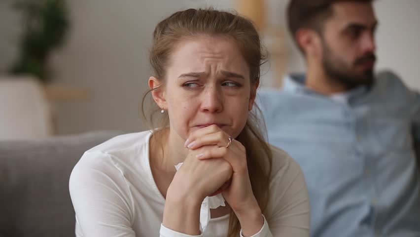 Depressed crying young woman wife in tears despair upset about family fights misunderstandings with husband feel frustrated offended sad after conflict tired of bad relationships or marriage problems Royalty-Free Stock Footage #1024307165