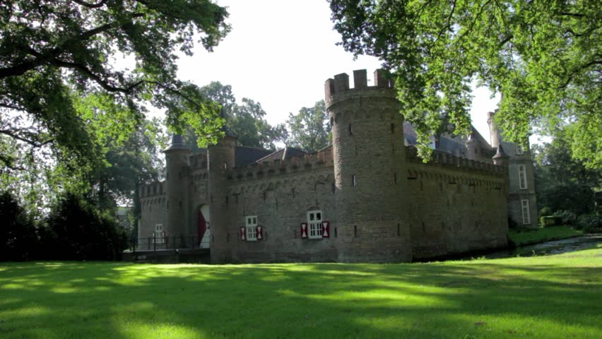Slider shot of castle with greenfield.