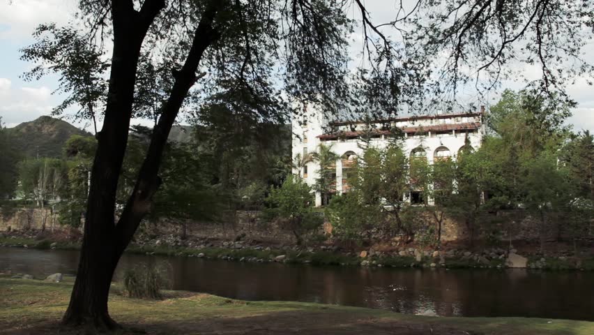 An Apartment Hotel near the Shore of the Santa Rosa River in Santa Rosa de Calamuchita, Cordoba Province, Argentina.