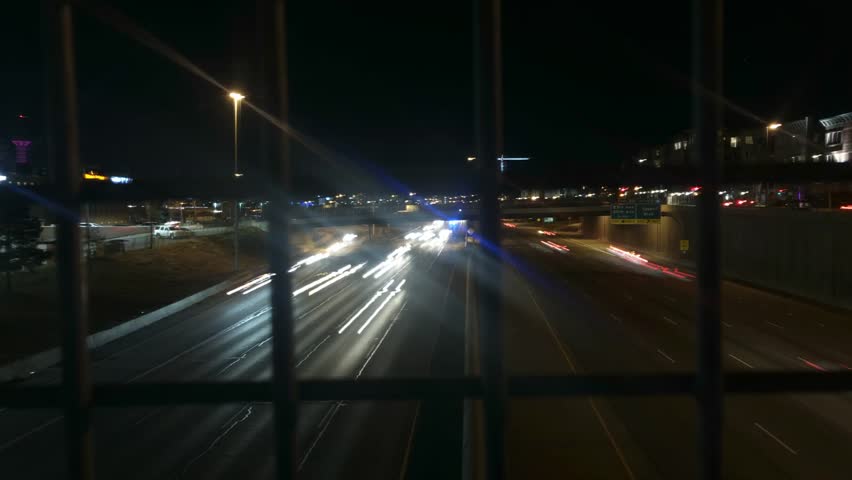 Nighttime timelapse of a freeway in downtown Denver Colorado