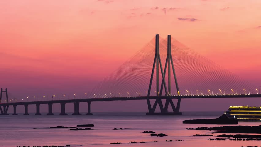 4K Zooming out Footage of The iconic Bandra Worli sea link bridge also known as Rajiv Gandhi Sea link, after Sunset, Mumbai, India.