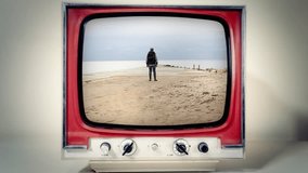 A retro vintage TV showing: a lone explorer discovering an amazing pier by the sea, in the middle of nowhere, in slow motion.
 - Powered by Shutterstock - Get 15% off with code: PIKWIZARD15