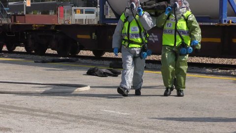 A mannequin injured from toxic gas held by policemen from Yassam unit with protective gear to rescue him in train station during a drill in Hadera, Israel, January 29, 2019