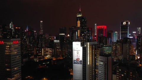 HONG KONG, HONG KONG - OCTOBER 10 2018: night time illuminated hong kong cityscape downtown aerial panorama 4k circa october 10 2018 hong kong.