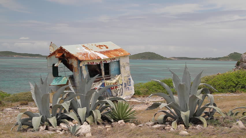 Abandoned beach bar at a beach on the Caribbean island of Antigua