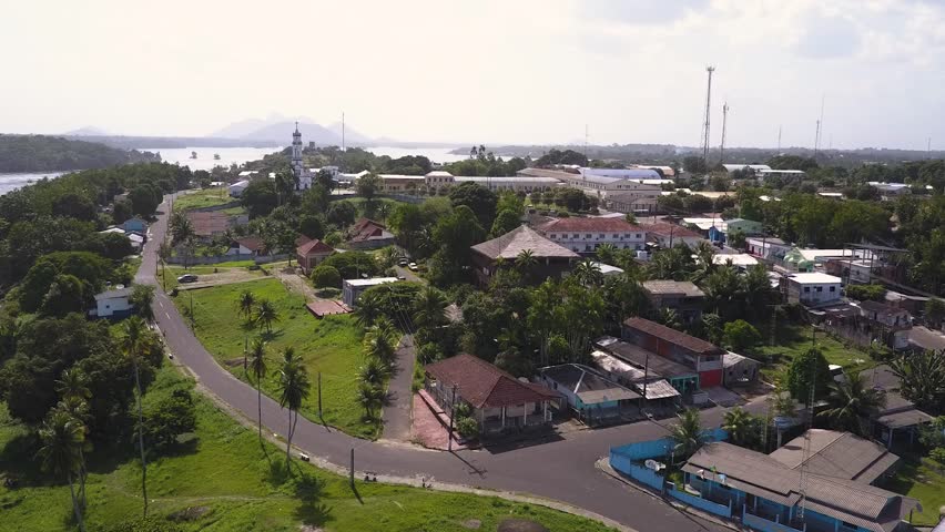 Aerial Drone Establishing Shot Pulling Back to Reveal the Large City of Sao Gabriel da Cachoeira Brazil and a Nice Landscape on the Negro River.