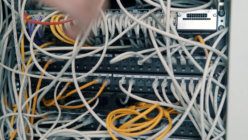 IT Engineer Patching Network Equipment Server Room. Technical Engineer Working Network Wires Lan Resolve Problem. Engineer Come To Server Room For Work, Check Problem Of Network. Man Working In Server Royalty-Free Stock Footage #1024395935