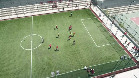 kids having soccer training at an outdoor field  วิดีโอสต็อก
