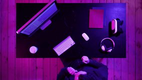 Tired programmer looking at some process on the computer. - Powered by Shutterstock - Get 15% off with code: PIKWIZARD15