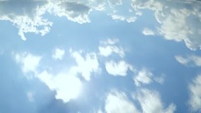 Fluffy, puffy soft small clouds time lapse, blue clear summer, sunny day, real colors in nice season, real mostly aerial view panoramic. 3840x2160.