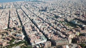 View from drone of Eixample district in Barcelona at sunny summer day