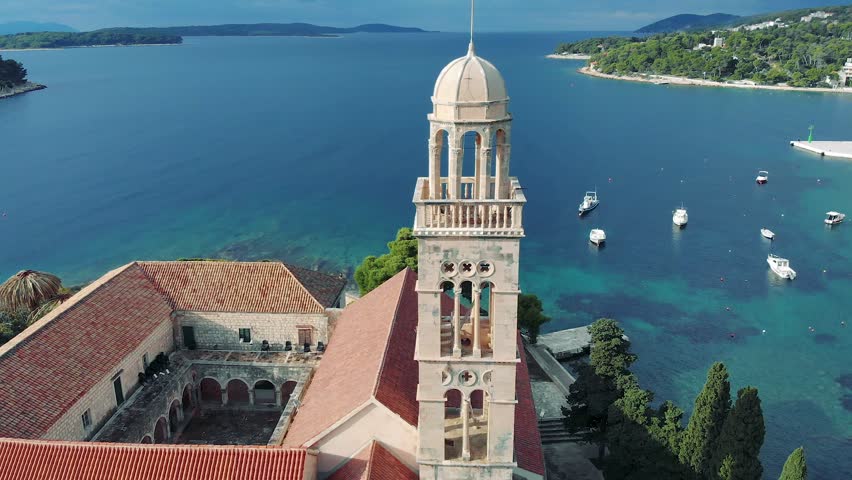 Franciscan Monastery on island of Hvar in city of Hvar view from above, aerial footage.