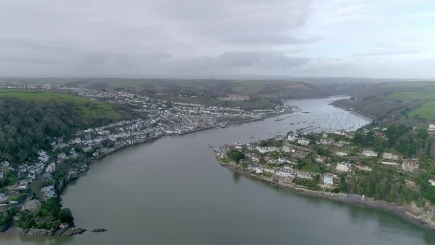 Aerial shot tracking from right to left of Dartmouth, Devon. A historical town in the South of the UK with rich Naval history.