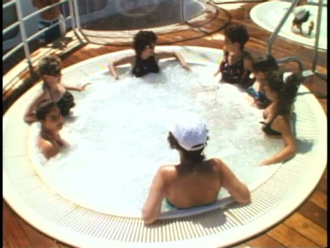 AT SEA, ATLANTIC OCEAN, 1994, People in Jacuzzi on a cruise ship