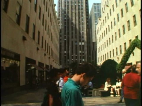 NEW YORK CITY, 1994, Rockefeller Center, crowd, tilt up RCA building