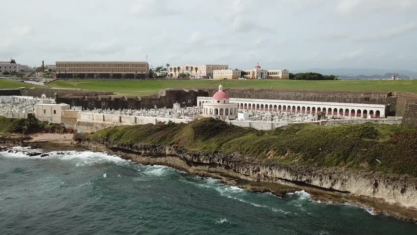 AERIAL: Flying in from the sea towards and over the Santa Maria Cemetery in San Juan, Puerto Rico.