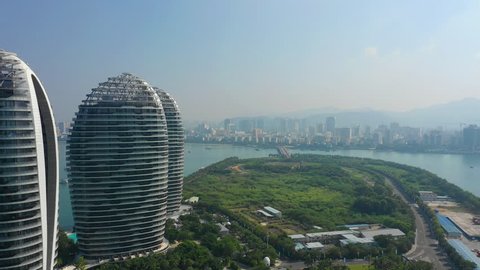sunny day sanya bay famous luxury hotel resort island aerial panorama 4k hainan china