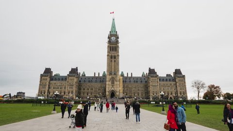 Ottawa, Canada, October 2018: Historic Canadian Parliament Building in Ottawa, many tourists visiting the sights. Hyperlapse video