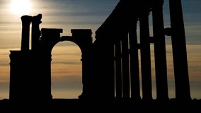 Palmyra, Syria: The Monumental Arch,  Arch of Triumph at Sunset, was a Roman ornamental archway - Powered by Shutterstock - Get 15% off with code: PIKWIZARD15