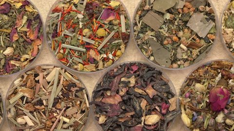 Chinese herbal tea sampler, overhead slider pan: stockvideo