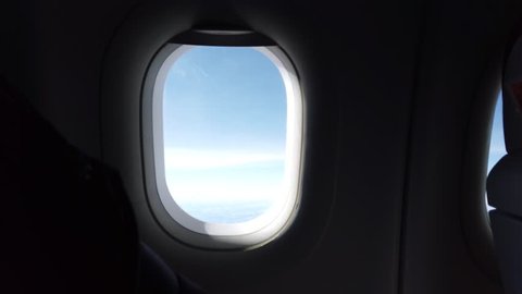 airplane window view above clouds sunset Stock Footage Video (100% ...