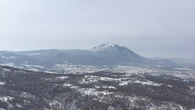 Eastern Serbian landscape and Rtanj mountain by winter 4K aerial footage