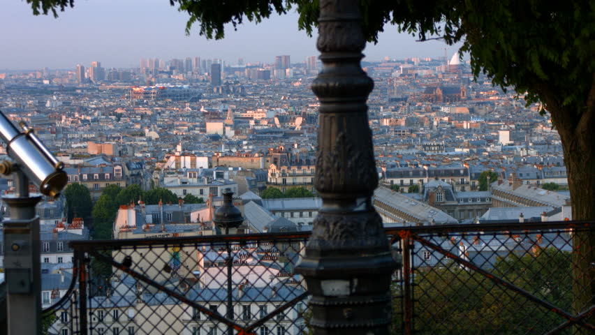 View of Paris from the top of the hill of Montmartre. It is morning and the zinc roofs give a blueish feel to the pictures.