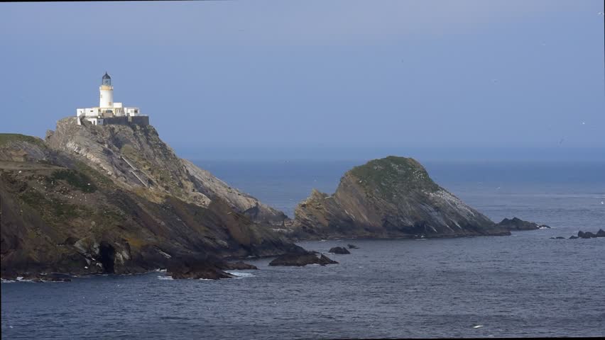 Muckle Flugga lighthouse, Britain's most northerly lighthouse on the island Unst, Shetland Islands, Scotland, UK Royalty-Free Stock Footage #1024523783